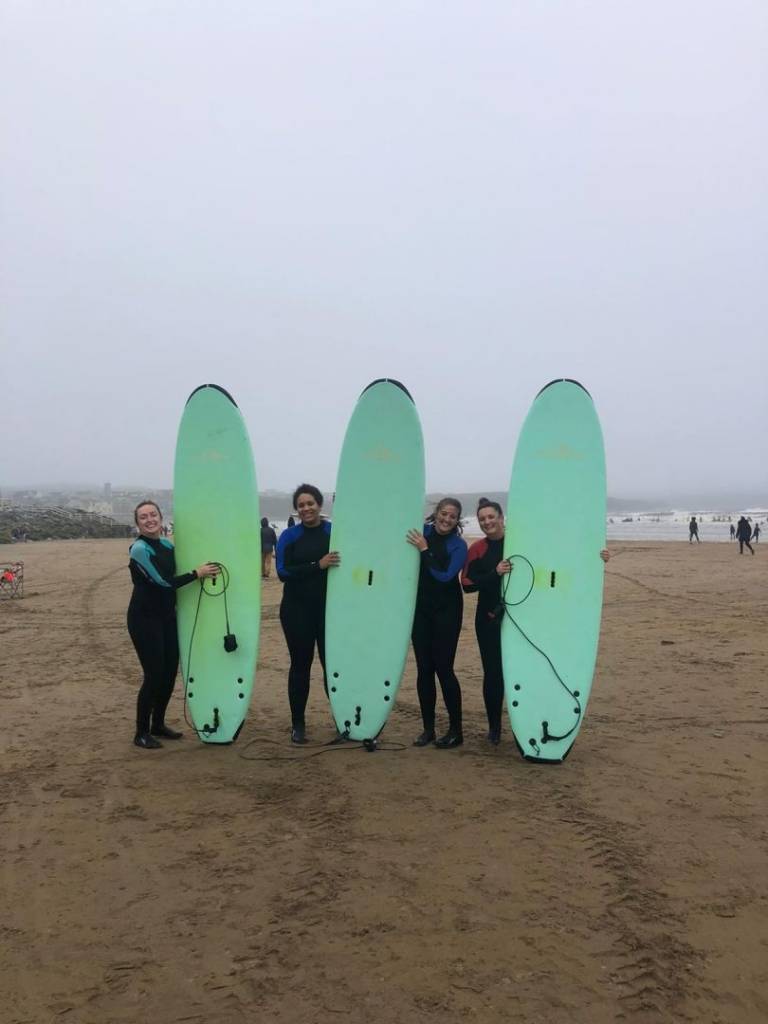 Surfing in Lahinch with Ireland Chauffeur Travel